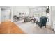 Bright living room with high ceilings, a fireplace, and lots of natural light from the French doors at 1410 Daley Ridge Ct, Lawrenceville, GA 30045