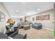 Large living room with carpet, neutral paint, furniture, and a window at 1410 Daley Ridge Ct, Lawrenceville, GA 30045