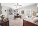 This home office has custom built-ins, large windows, and space for both work and relaxation at 1410 Daley Ridge Ct, Lawrenceville, GA 30045