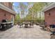 Outdoor patio with seating area and built in grill, perfect for entertaining at 1410 Daley Ridge Ct, Lawrenceville, GA 30045