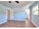 Bright bedroom with light blue walls and wood floors, with an open door to the bathroom at 2538 Three Bars Drive, Grayson, GA 30017