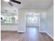 Open dining room with wood flooring and a modern light fixture at 2538 Three Bars Drive, Grayson, GA 30017