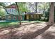 Charming two-story home with colorful exterior, green lawn and shade trees at 2538 Three Bars Drive, Grayson, GA 30017
