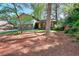 Home exterior with beautiful yard and colorful trim, lush trees at 2538 Three Bars Drive, Grayson, GA 30017