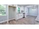 Bright kitchen features shaker cabinets, stainless appliances, and gray countertops at 2538 Three Bars Drive, Grayson, GA 30017