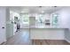 Renovated kitchen boasts stainless steel appliances and a large center island at 2538 Three Bars Drive, Grayson, GA 30017