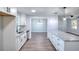 Bright kitchen with stainless appliances, gray countertops, and dining room at 2538 Three Bars Drive, Grayson, GA 30017