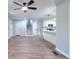 Open-concept floor plan with sleek flooring and access to the kitchen at 2538 Three Bars Drive, Grayson, GA 30017