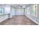 Open-concept living area with new flooring, neutral tones, and bright, natural light at 2538 Three Bars Drive, Grayson, GA 30017