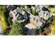 Stunning aerial view of a stately home with a three-car garage and well-manicured landscaping at 5473 Heyward Square Pl, Marietta, GA 30068