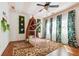 Charming bedroom with unique decor, a playful bed frame, and large windows at 5473 Heyward Square Pl, Marietta, GA 30068