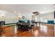 This spacious game room features wood floors, large windows, and an amazing layout with a game and pool table at 5473 Heyward Square Pl, Marietta, GA 30068