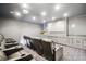 Bright home theater room with reclining chairs and a mounted projector at 5473 Heyward Square Pl, Marietta, GA 30068