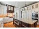 Gourmet kitchen with granite countertops, stainless steel appliances, and a large center island at 5473 Heyward Square Pl, Marietta, GA 30068