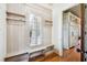 Functional mudroom boasts custom millwork with built-in bench and shelving at 5473 Heyward Square Pl, Marietta, GA 30068