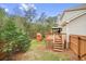 Backyard featuring playset and access from the deck at 603 Redcoat Cir, Canton, GA 30114