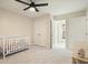 Bedroom features neutral walls and a crib, ideal for a baby's room or a peaceful retreat at 603 Redcoat Cir, Canton, GA 30114