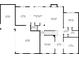 First floorplan showing garage, kitchen, living and dining rooms, foyer, pantry, bathrooms, and a bedroom at 603 Redcoat Cir, Canton, GA 30114
