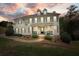 Stately home with beautiful curb appeal, dormer windows, manicured lawn, and an inviting front porch at 603 Redcoat Cir, Canton, GA 30114