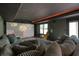Relaxing home theater with a plush sectional sofa, movie screen, and charming chair at 603 Redcoat Cir, Canton, GA 30114