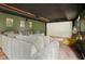 Comfortable home theater featuring a plush, oversized sectional sofa and movie screen at 603 Redcoat Cir, Canton, GA 30114