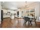 Eat-in kitchen with white cabinets, stainless steel appliances, and an island at 603 Redcoat Cir, Canton, GA 30114
