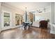 Open-concept living and dining area features hardwood floors and abundant natural light at 603 Redcoat Cir, Canton, GA 30114