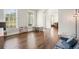 Bright living room with hardwood floors, natural light, and neutral tones at 603 Redcoat Cir, Canton, GA 30114
