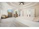 Carpeted main bedroom features a tray ceiling and a dresser with a TV at 603 Redcoat Cir, Canton, GA 30114