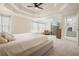 Main bedroom features carpet and access to the en suite bathroom and stairs at 603 Redcoat Cir, Canton, GA 30114