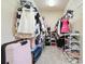 Walk-in closet features wire shelving for clothing, shoes, and luggage storage solutions at 603 Redcoat Cir, Canton, GA 30114