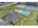 Aerial view of community clubhouse and pool at 866 Coopers Ridge Sw Path, Grayson, GA 30017