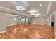 Open basement featuring hardwood flooring and a kitchen at 866 Coopers Ridge Sw Path, Grayson, GA 30017
