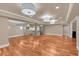 Finished basement featuring hardwood floors, recessed lighting, and a kitchenette at 866 Coopers Ridge Sw Path, Grayson, GA 30017