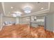 Open basement with hardwood floors, kitchenette, and play area at 866 Coopers Ridge Sw Path, Grayson, GA 30017
