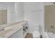 Bright bathroom featuring a sink, toilet, and tub/shower combo at 866 Coopers Ridge Sw Path, Grayson, GA 30017