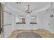 Spacious bathroom with double vanities, granite countertops and elegant chandelier at 866 Coopers Ridge Sw Path, Grayson, GA 30017