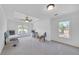 Bright bedroom with large windows and sitting area at 866 Coopers Ridge Sw Path, Grayson, GA 30017