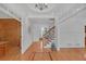 Spacious foyer with beautiful hardwood floors, detailed trim, and modern chandelier at 866 Coopers Ridge Sw Path, Grayson, GA 30017
