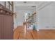 Elegant foyer with hardwood floors, decorative staircase, and views into adjacent living spaces at 866 Coopers Ridge Sw Path, Grayson, GA 30017