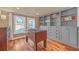 Inviting game room with hardwood floors, built-in bookshelves and lots of natural light at 866 Coopers Ridge Sw Path, Grayson, GA 30017