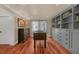 Recreation room featuring hardwood floors, foosball table and built-in bookshelves at 866 Coopers Ridge Sw Path, Grayson, GA 30017