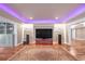 Stylish living room with hardwood floors, stone accents, and recessed lighting at 866 Coopers Ridge Sw Path, Grayson, GA 30017