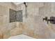 Modern shower features neutral colored tile and shower seat at 866 Coopers Ridge Sw Path, Grayson, GA 30017