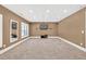 Bonus room featuring a TV, carpet floors and decorative ceilings at 1459 Harris Rd, Lawrenceville, GA 30043
