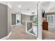 Upstairs hallway featuring a neutral color palette and crown molding at 1459 Harris Rd, Lawrenceville, GA 30043