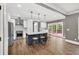 Bright, updated kitchen featuring stainless steel appliances and view of the outdoor deck at 1459 Harris Rd, Lawrenceville, GA 30043