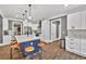Modern kitchen with a large island, stainless steel appliances, and a sleek design at 1459 Harris Rd, Lawrenceville, GA 30043