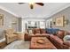 Comfortable living room with ceiling fan, views of the kitchen, and stylish decor at 1459 Harris Rd, Lawrenceville, GA 30043