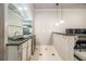 Wet bar area with granite countertop, great for entertaining at 3574 N Druid Hills Rd, Decatur, GA 30033
